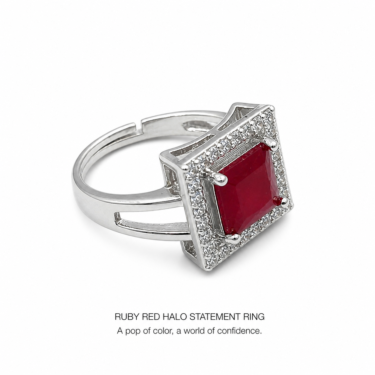 Silver ring with red gemstone halo